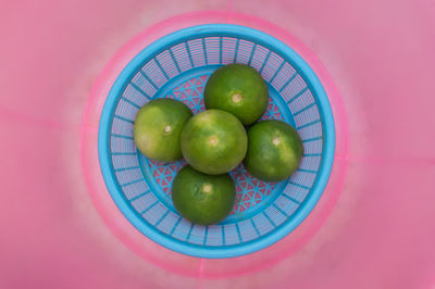 High angle view of apples in bowl on table