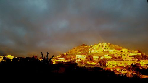 View of illuminated city at night