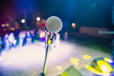 Singers microphone on a stand on stage during a concert