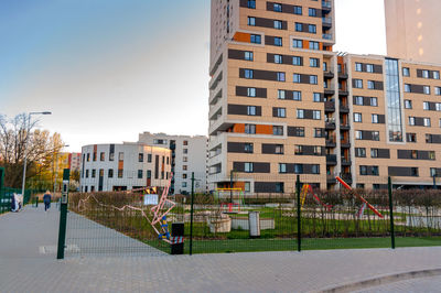 Buildings in city against sky