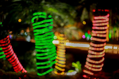 Defocused image of illuminated lights at night