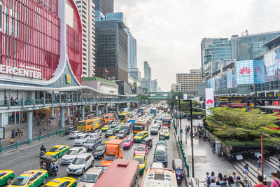 High angle view of city street and buildings against sky