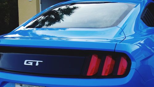 Close-up of blue car