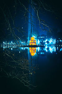 Reflection of illuminated buildings in water