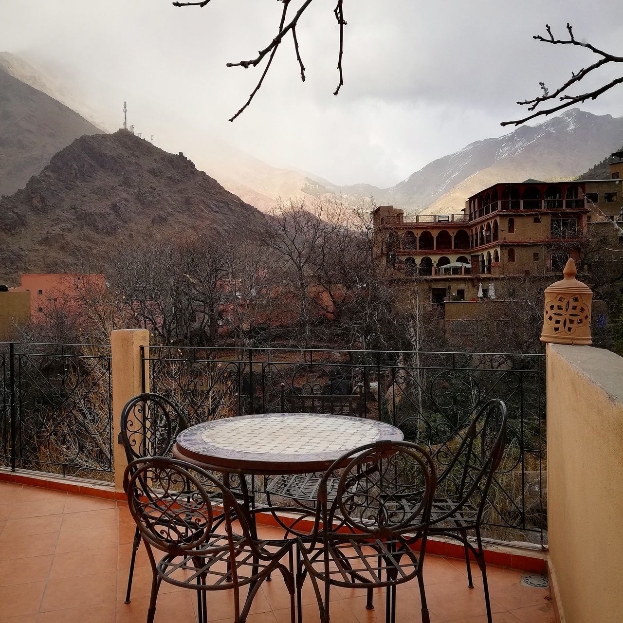 TABLE AGAINST MOUNTAINS