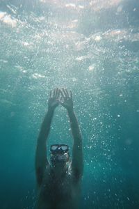 Man swimming in sea