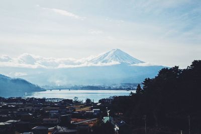 Majestic mt fuji against sky