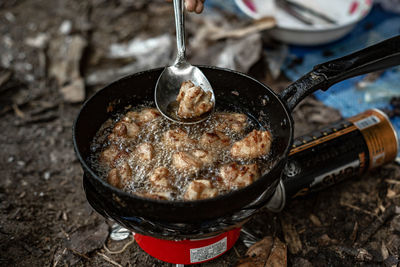 High angle view of meat in cooking pan