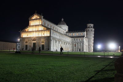 Piazza miracoli in pisa at night anmonuments as the tower and solitude of global pandemic in tuscany