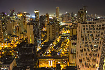 High angle view of illuminated cityscape at night