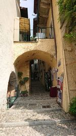 Alley amidst buildings in city