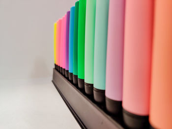 Close-up of multi colored felt tip pens on table