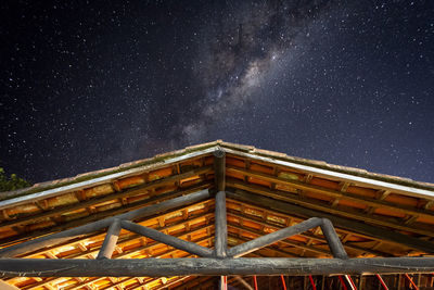 Low angle view of building against sky at night