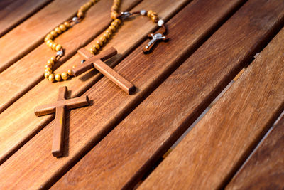 High angle view of metal container on wood