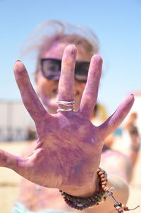 Close-up of wife hand against blurred background