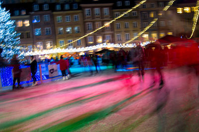 People in city at night