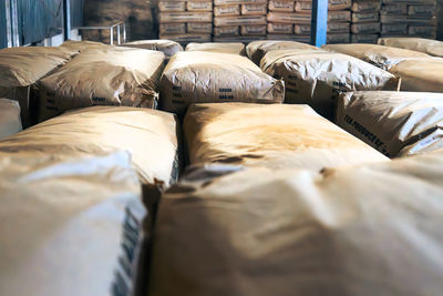 Warehouse full of paper sacks with tea. producing process in tea factory in sri lanka.