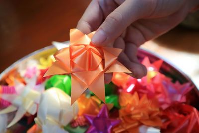 Close-up of hand holding multi colored bouquet