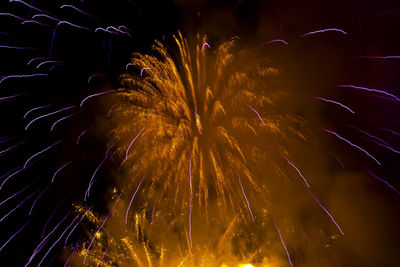 Firework display at night