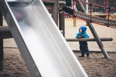 Full length of boy in playground