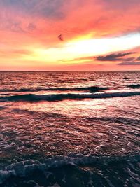 Scenic view of sea against sky at sunset