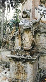 Close-up of statue against trees