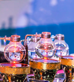 Close-up of wine bottles on table