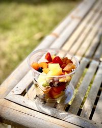 High angle view of chopped fruits in bowl on table