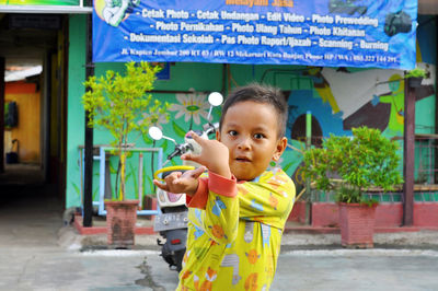 A child in action looking at the camera