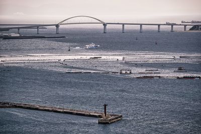 Pier over sea against sky