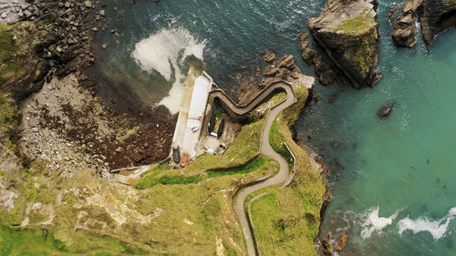 High angle view of rock formation on beach