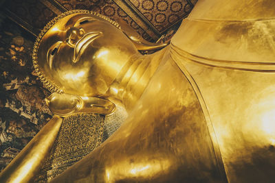 Low angle view of buddha statue in temple