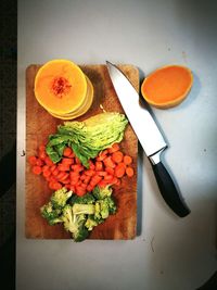 High angle view of chopped vegetables on cutting board