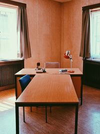 Chairs and table on window