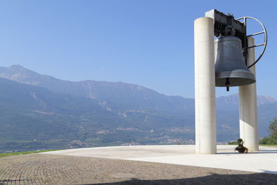 View of mountain range against blue sky