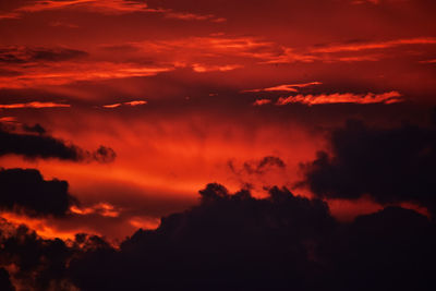 Low angle view of dramatic sky during sunset