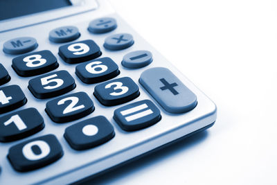 Close up image of calculator isolated in white