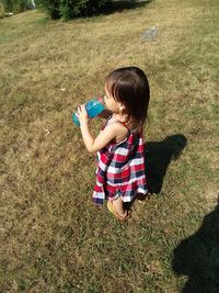 High angle view of girl on field