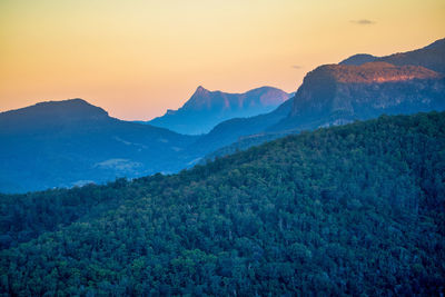 Scenic view of mountains against sky during sunset