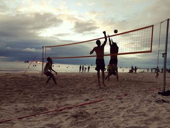 People playing on beach