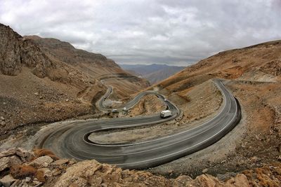 Aerial view of mountain road against sky