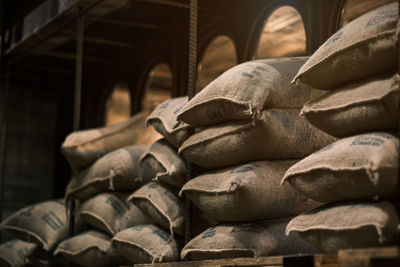 Stack hemp sacks of rice, sacks of rice in the warehouse, 