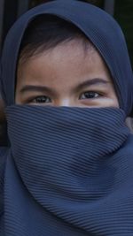 Close-up of woman wearing hat