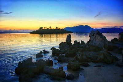 Scenic view of sea at sunset