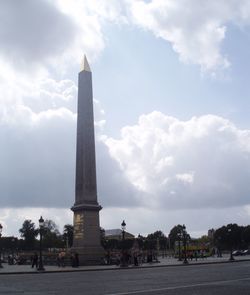 Monument against cloudy sky