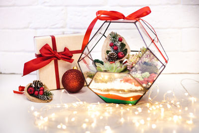 Close-up of christmas decorations on table