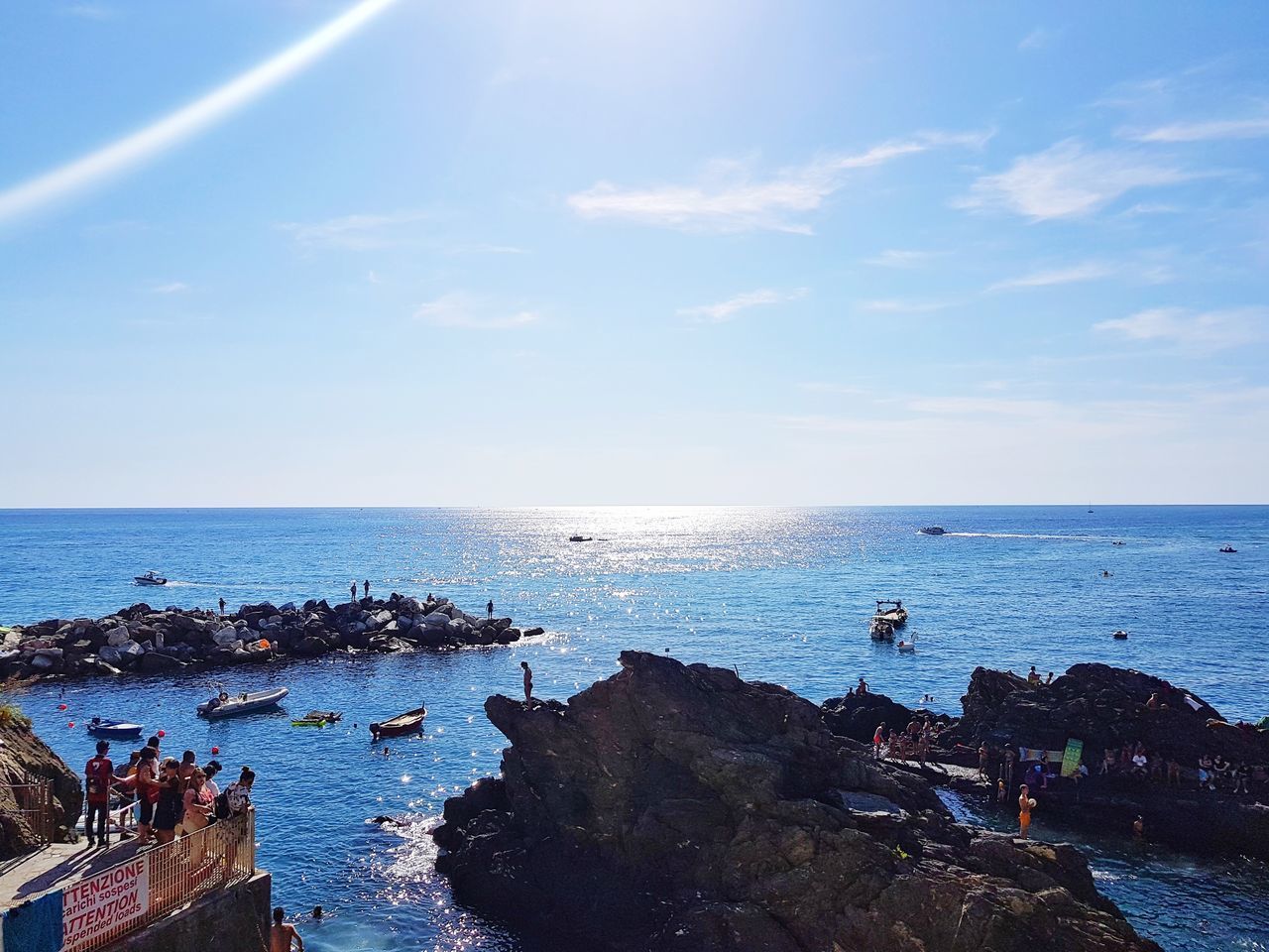 SCENIC VIEW OF BEACH AGAINST BLUE SKY