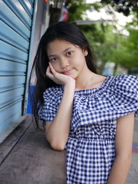 Portrait of young woman looking away