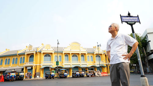 Man standing in a city