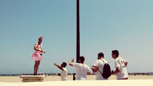 View of people against clear sky